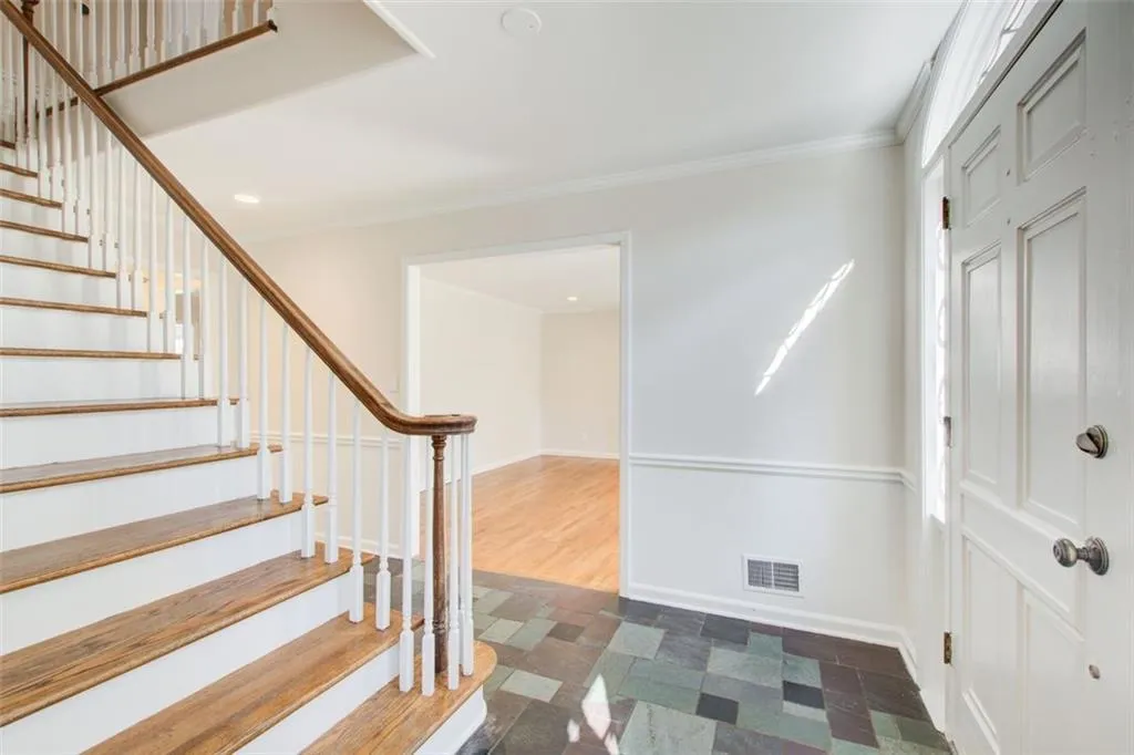 As you enter the home the dining room is to the left and office-flex room is on  the right.