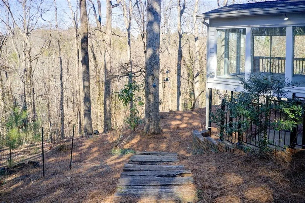 Picture of back yard and sunroom