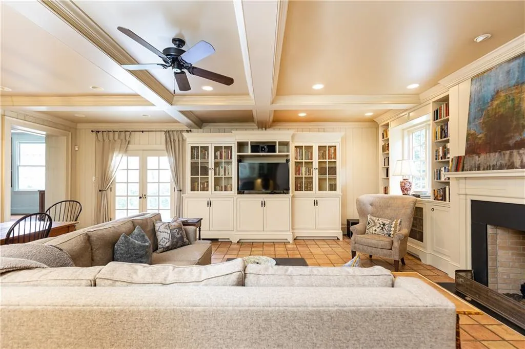 Generous family room provides plenty of space for everyone to gather for fun and good times.