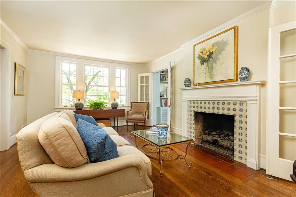 This beautiful living room is flooded with natural light.