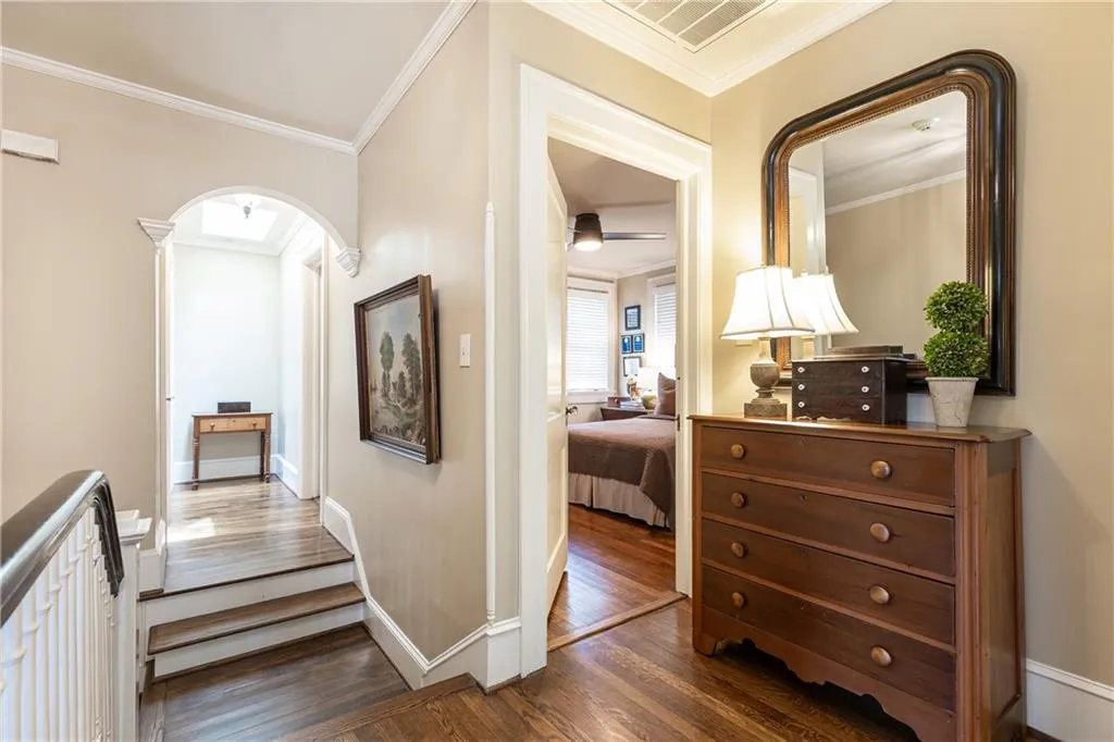 The second floor hosts all the bedrooms right off this elegant hall.