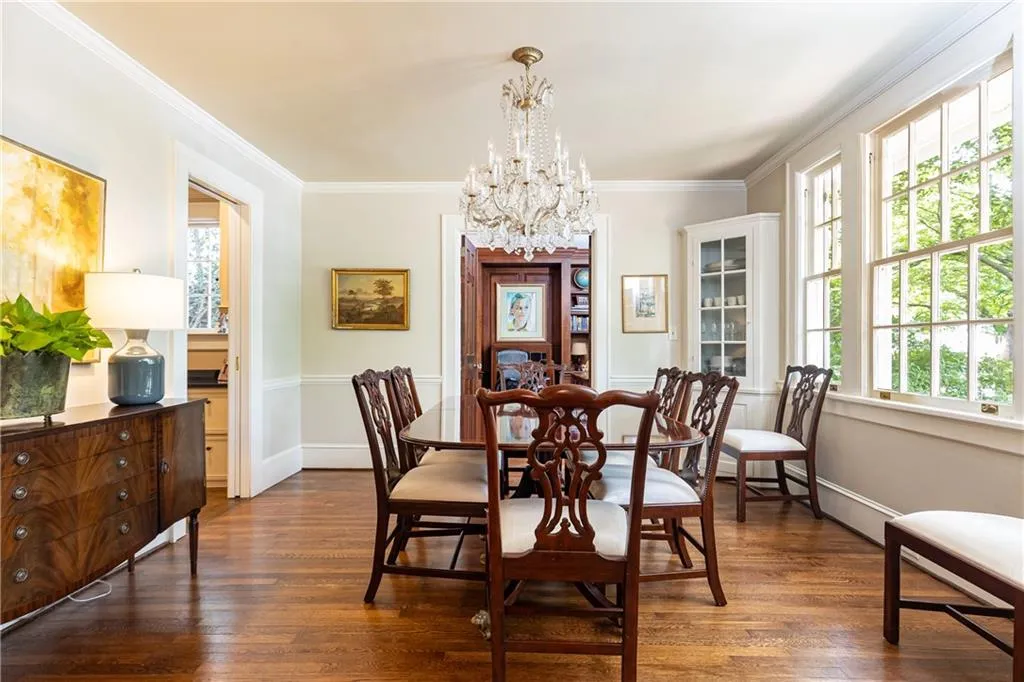 The elegant dining room is perfect for entertaining, and is flooded with natural light.