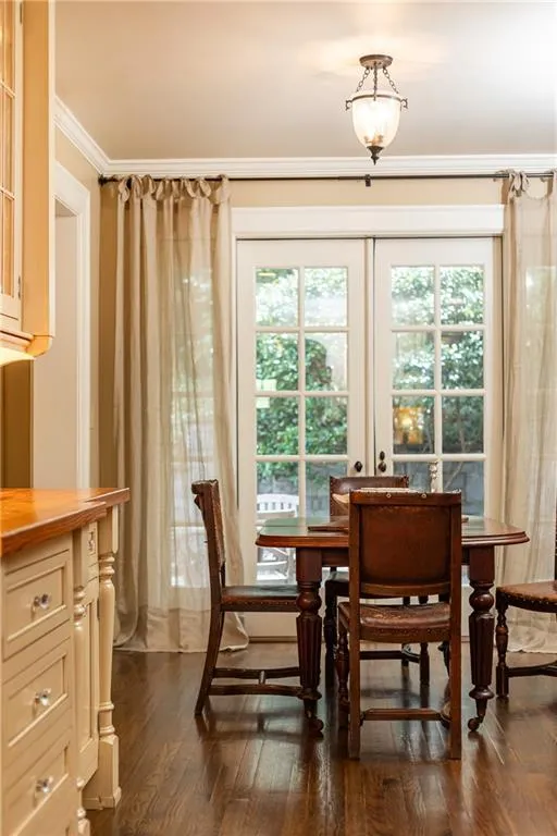 French doors off the breakfast room lead to a beautifully landscaped patio and back yard.