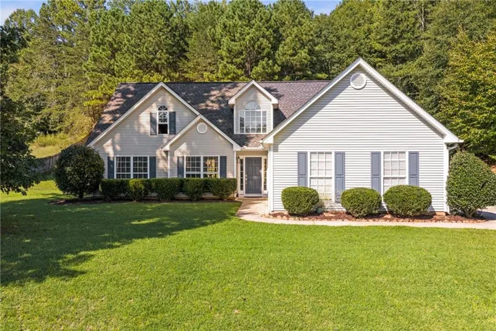 Gable roof design with light-colored siding