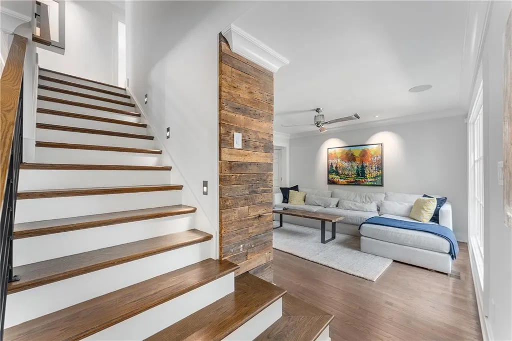Staircase leading to 2nd floor bedroom level and laundry room