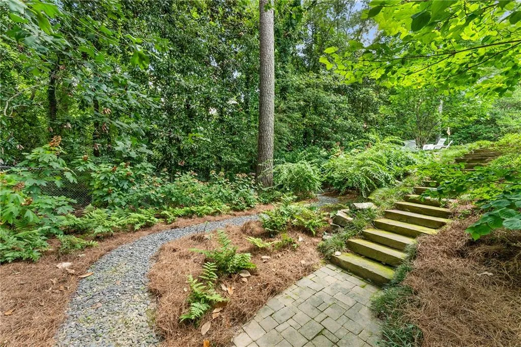 View of yard featuring stairs