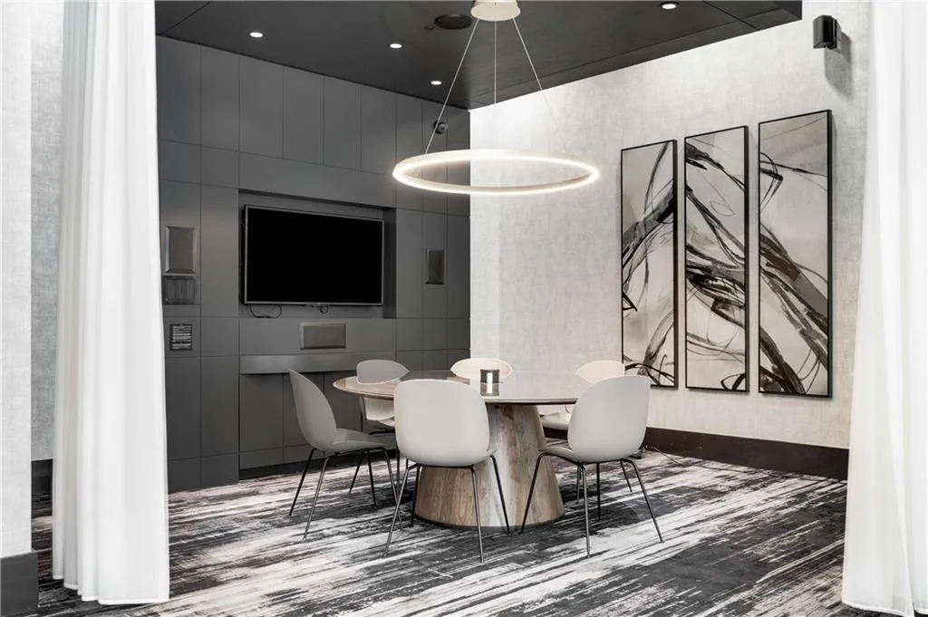 Dining room featuring tile walls