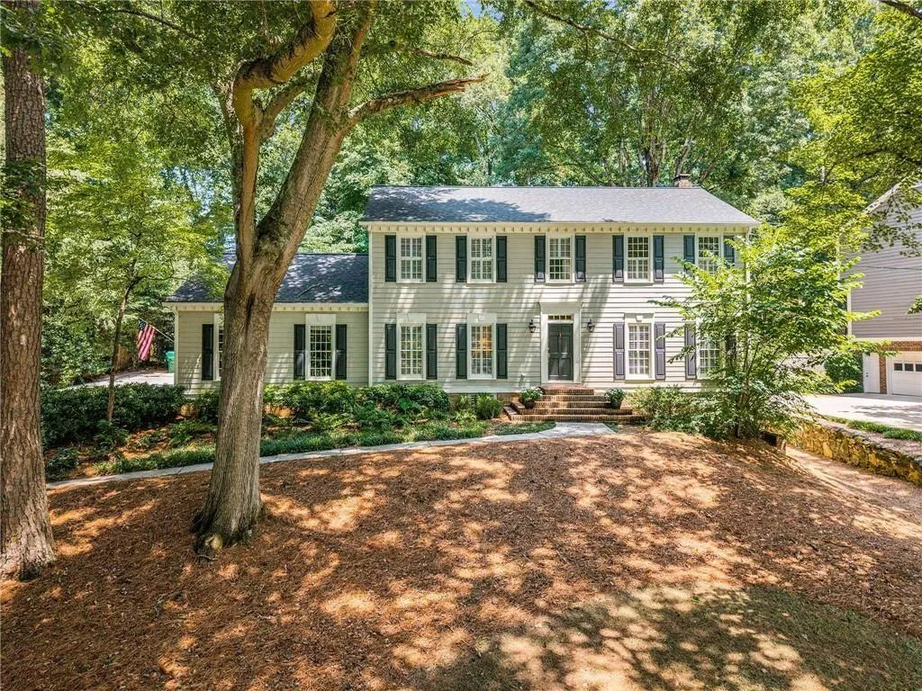 Colonial inspired home with a chimney