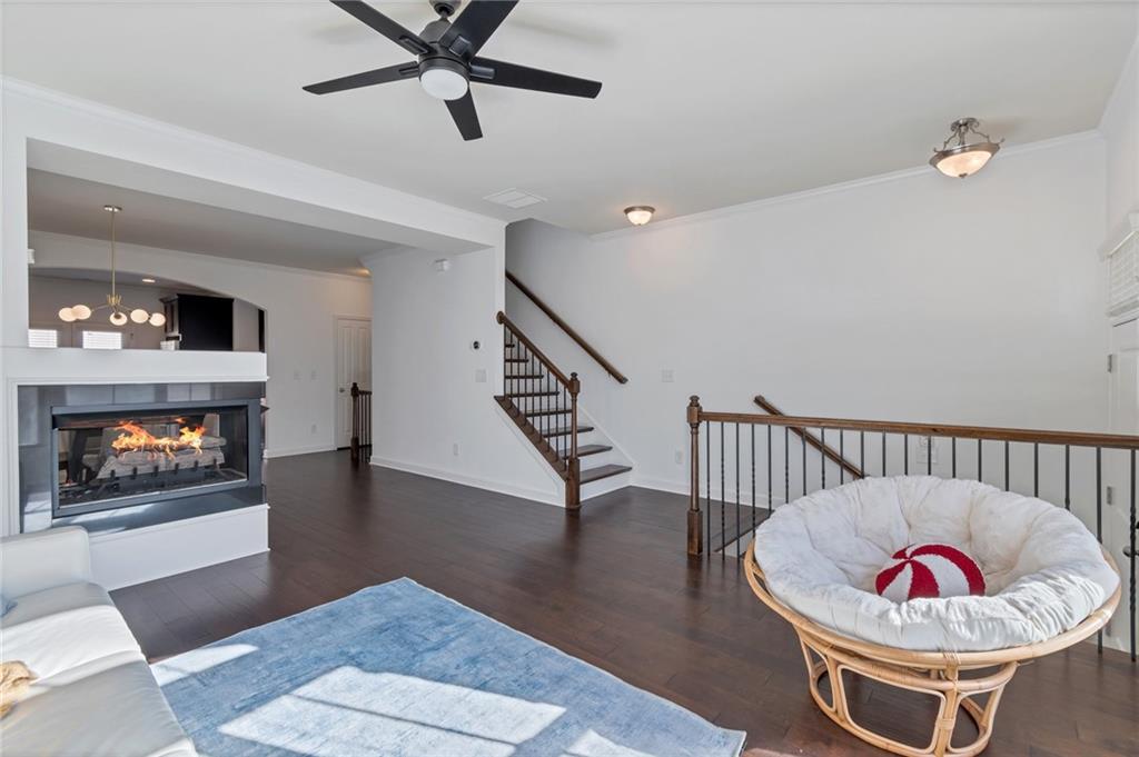 Bright, sunny and spacious living room with two sided fire place Bright, sunny and spacious living room with two sided fire place