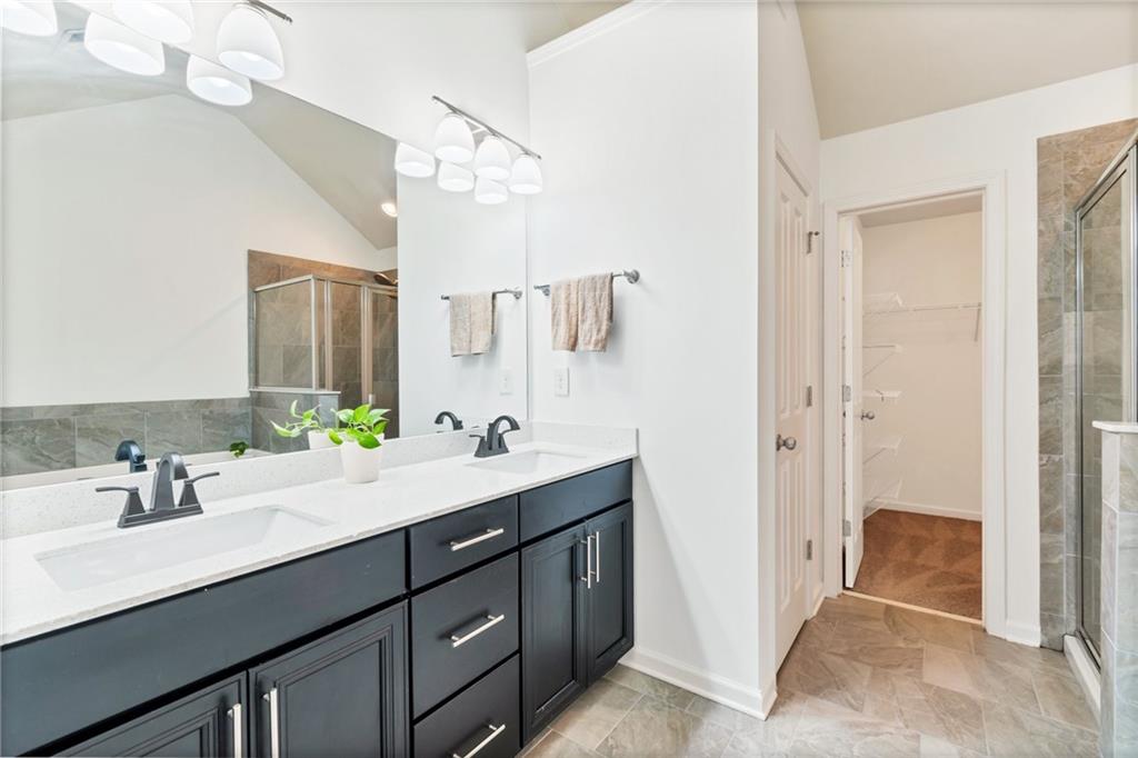 Large primary bathroom with double vanity Large primary bathroom with double vanity