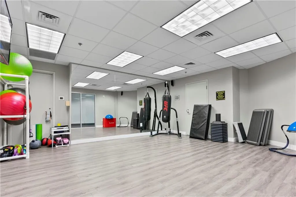 Workout area featuring a paneled ceiling Workout area featuring a paneled ceiling