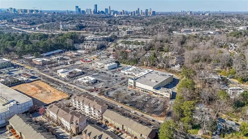 Birds eye view of property with a city view