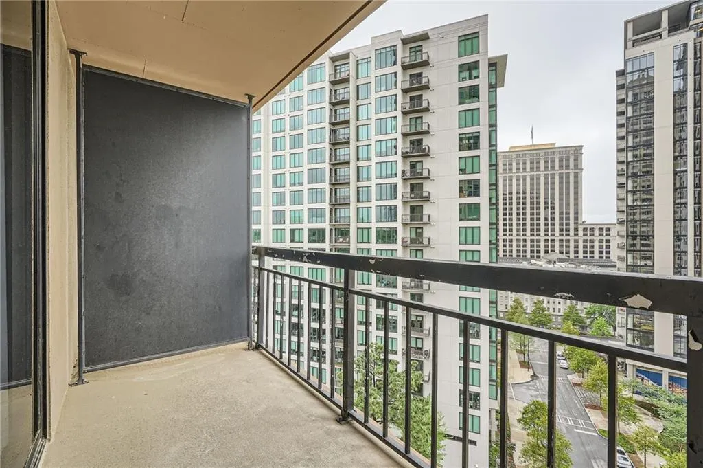 Balcony featuring a view of city