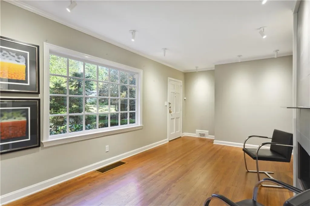 Large Picture Window provides natural light to the formal rooms