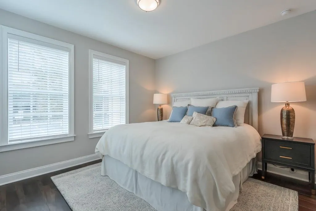 Terrace Bedroom featuring multiple windows with natural light and hardwood floors