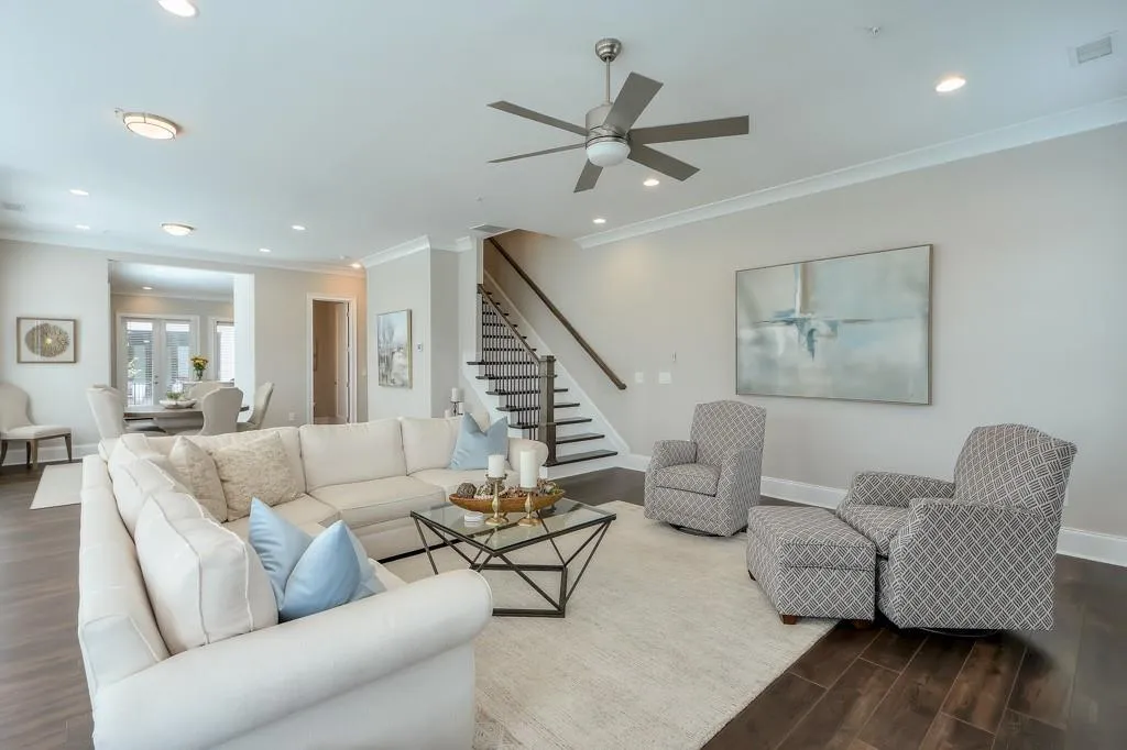 Main Level Living room/Dining Area featuring hardwood flooring, natural light and a ceiling fan