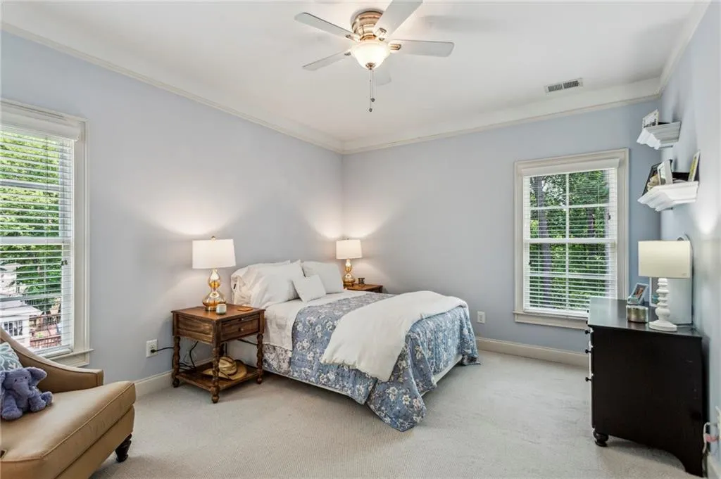 Bedroom #3 with shared bathroom ornamental molding, baseboards, and a ceiling fan