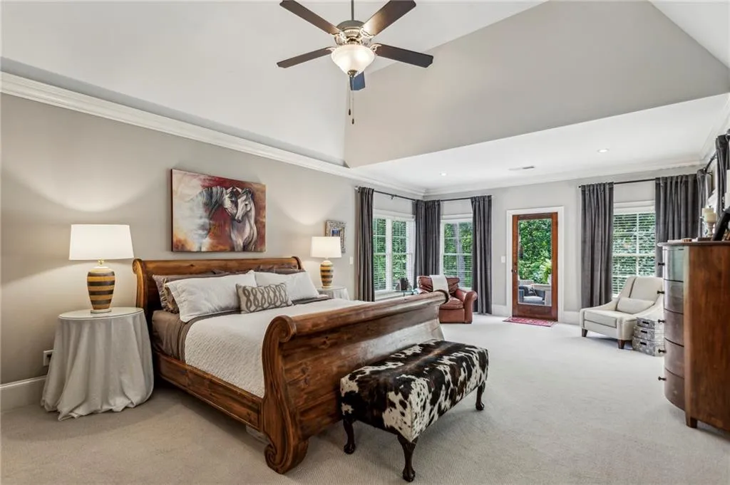 Large primary suite featuring sitting room, door to quaint Juliette balcony