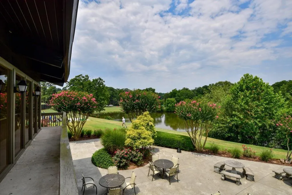 View of patio / terrace with a water view