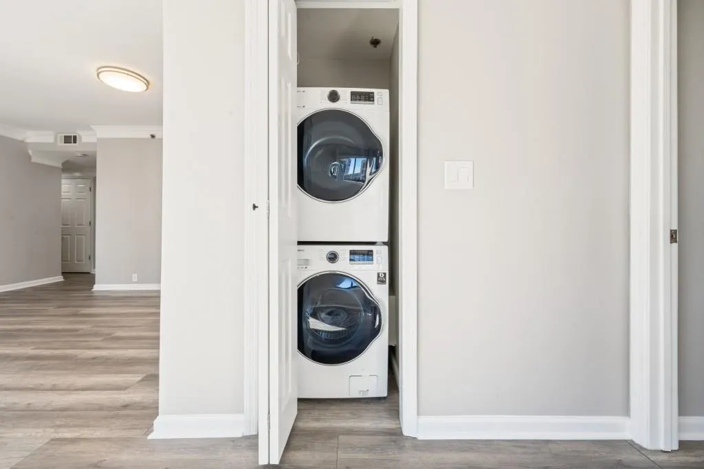 New Washer/dryer remains with property