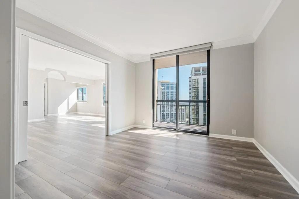Secondary bedroom with private patio, pocket doors, new room darkening shades