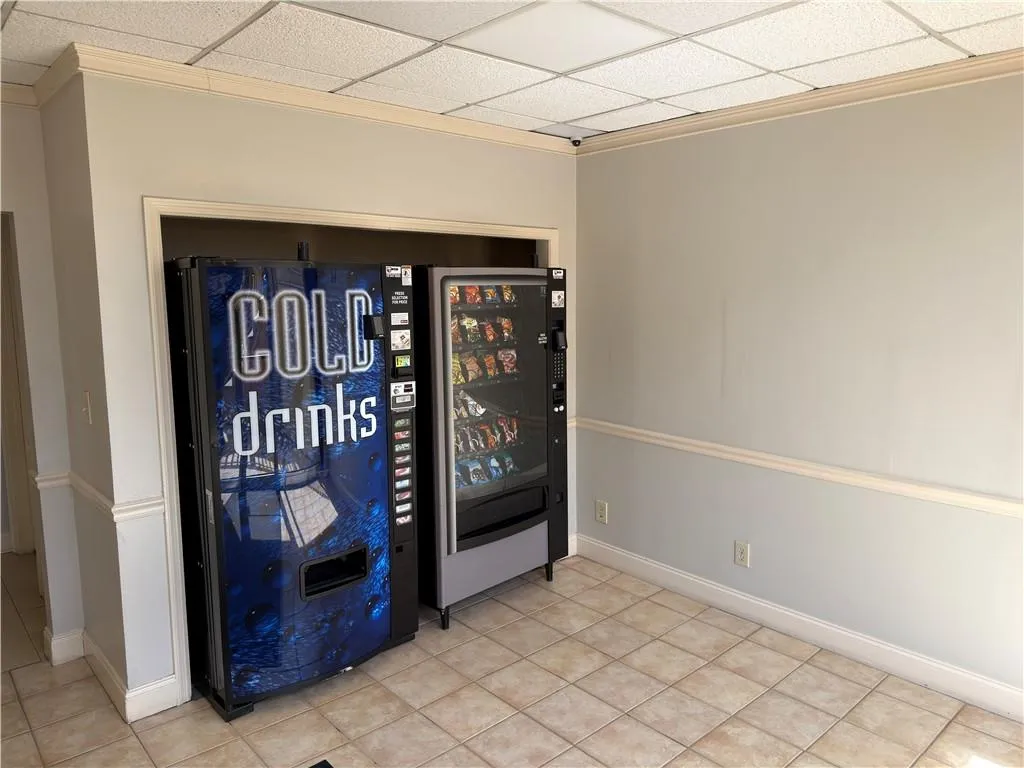Detailed view of ornamental molding and a drop ceiling