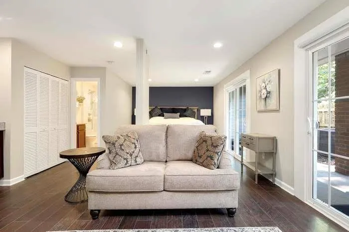 Bedroom 4 with sitting area, wet bar, full bath and exterior access.