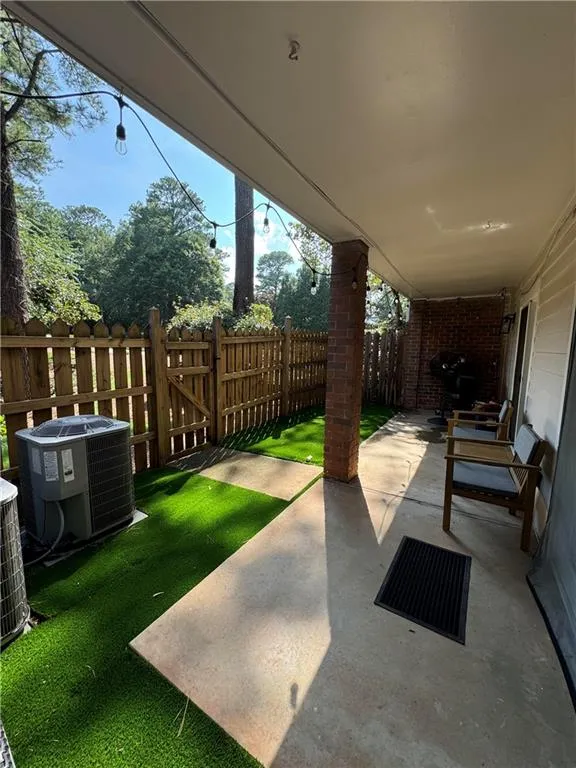 View of patio with cooling unit