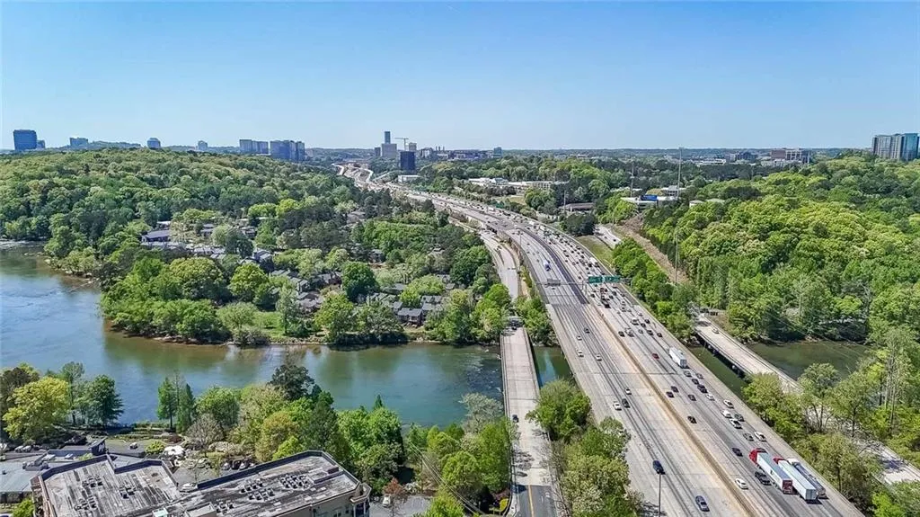 Aerial view with a city view and a water view