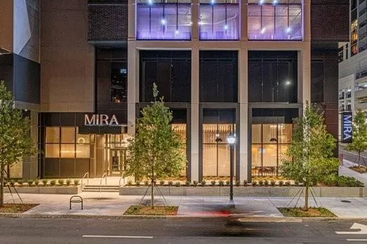 View of exterior entry at night