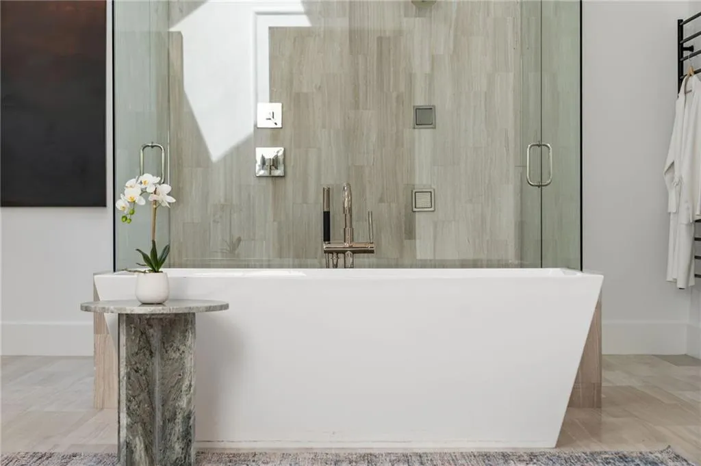 Full bathroom with a stall shower