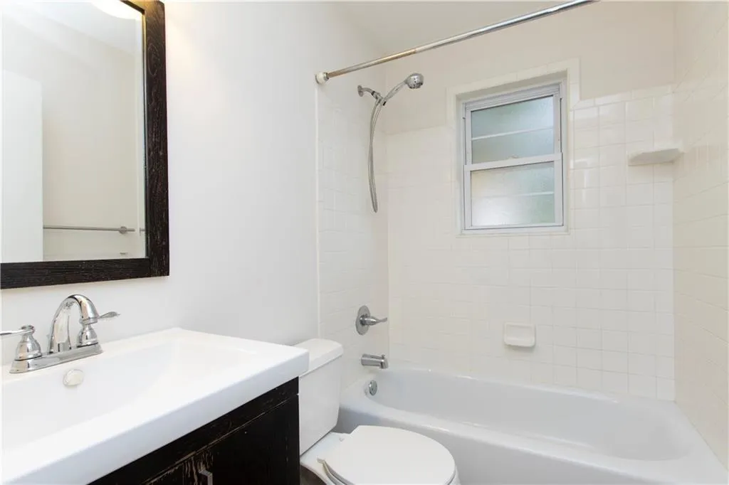 Full bathroom featuring vanity and bathtub / shower combination