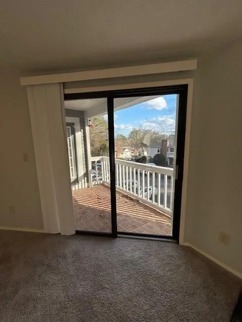 Entryway featuring carpet