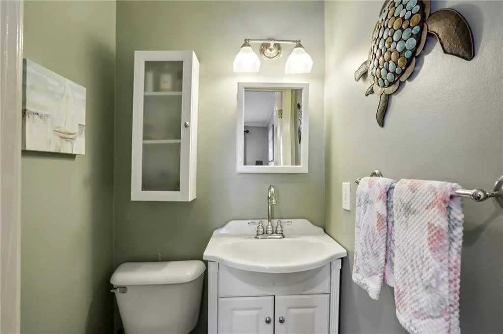 Bathroom featuring toilet and vanity