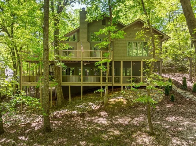 Multi-level rear exterior with extensive decking
