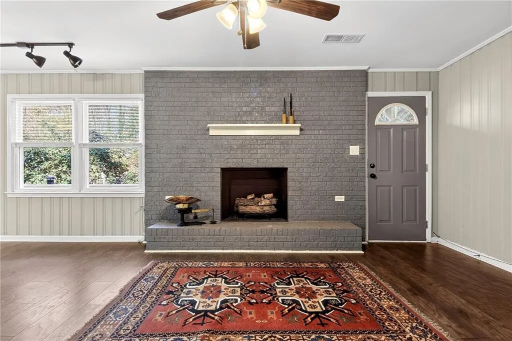 Brick + Gas Log Fireplace | Wooded Views | Neutral Paint | Luxury Vinyl Flooring