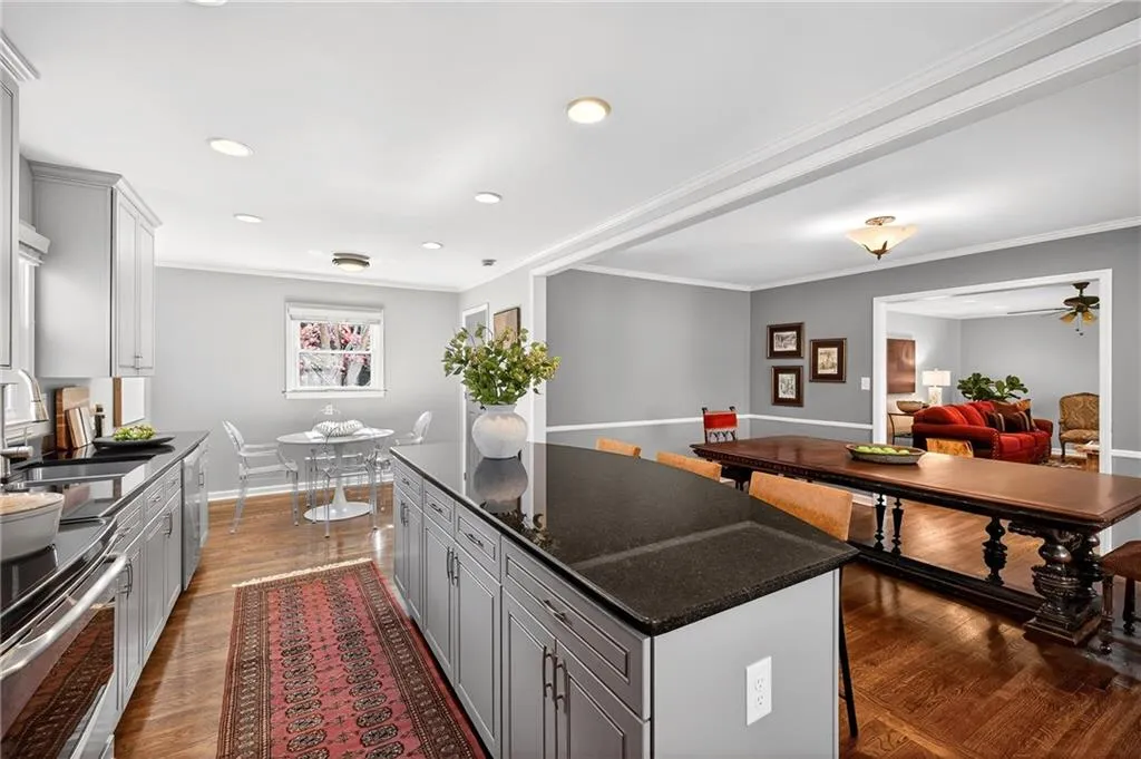 Kitchen Dining + Living Room Views | Neutral Paint | Entertainers Delight | Gleaming Hardwood Floors