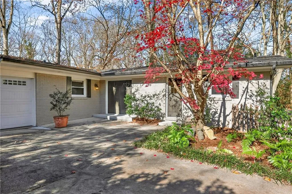 Serene Wooded Homesite | Professional Landscape | Level Drive | Dual Car Front Entry Garage