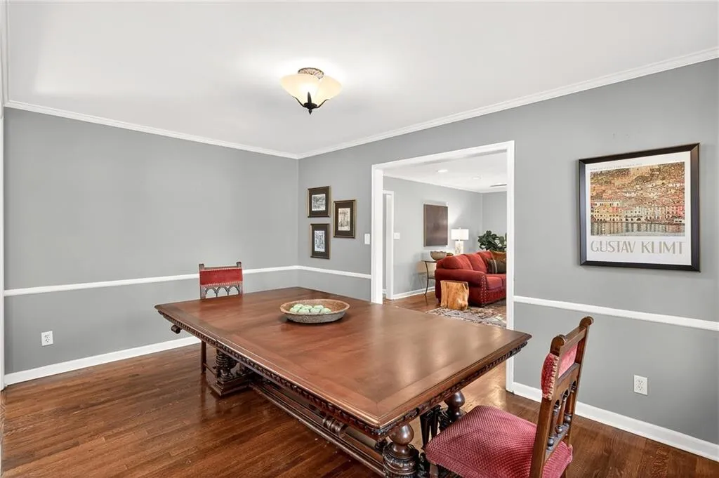 Oversized Dining Seats Ten | Views to Living Room + Kitchen | Neutral Paint