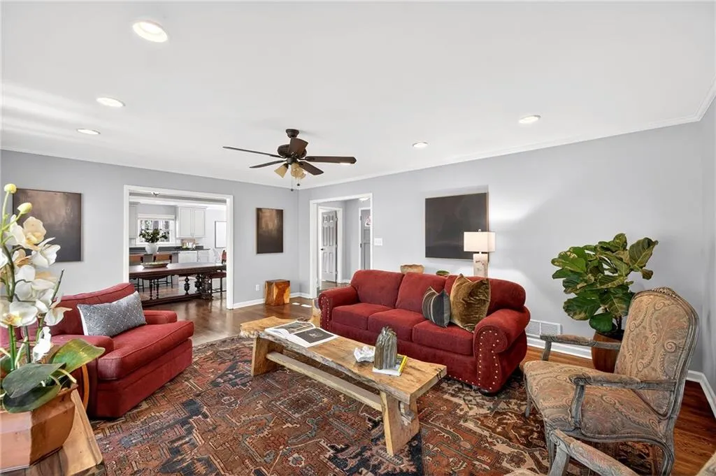 Spacious Living Room | Views to Dining + Kitchen | Bright Natural Light | Fresh Neutral Paint | Recessed Lighting