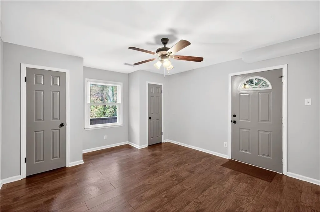 Optional Forth Bedroom or Terrace Level Office | Direct Outdoor Access | Leads to Driveway + Streamside Seating | Dual Closets | Wooded Views | Neutral Paint