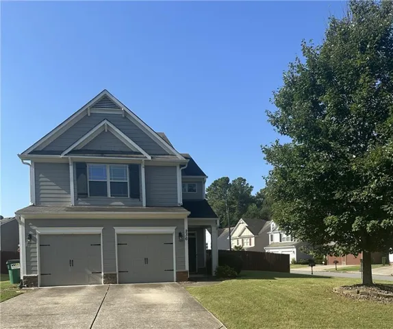 Welcome to 236 Highland Village Lane, a beautifully maintained home in the desirable Highland Village community of Woodstock.