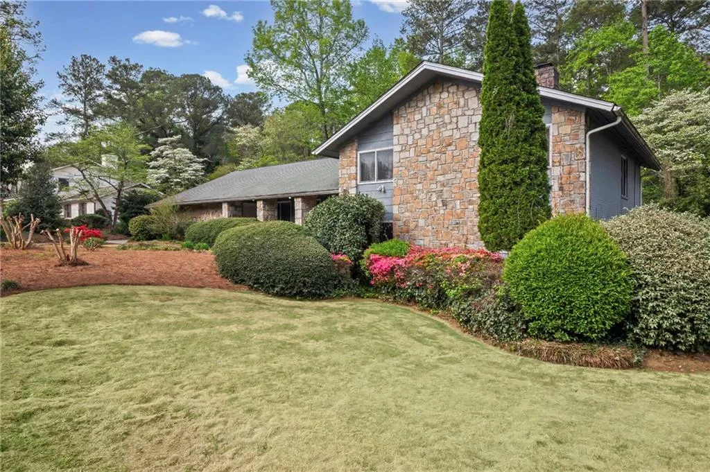 Exterior features siding and stone accents