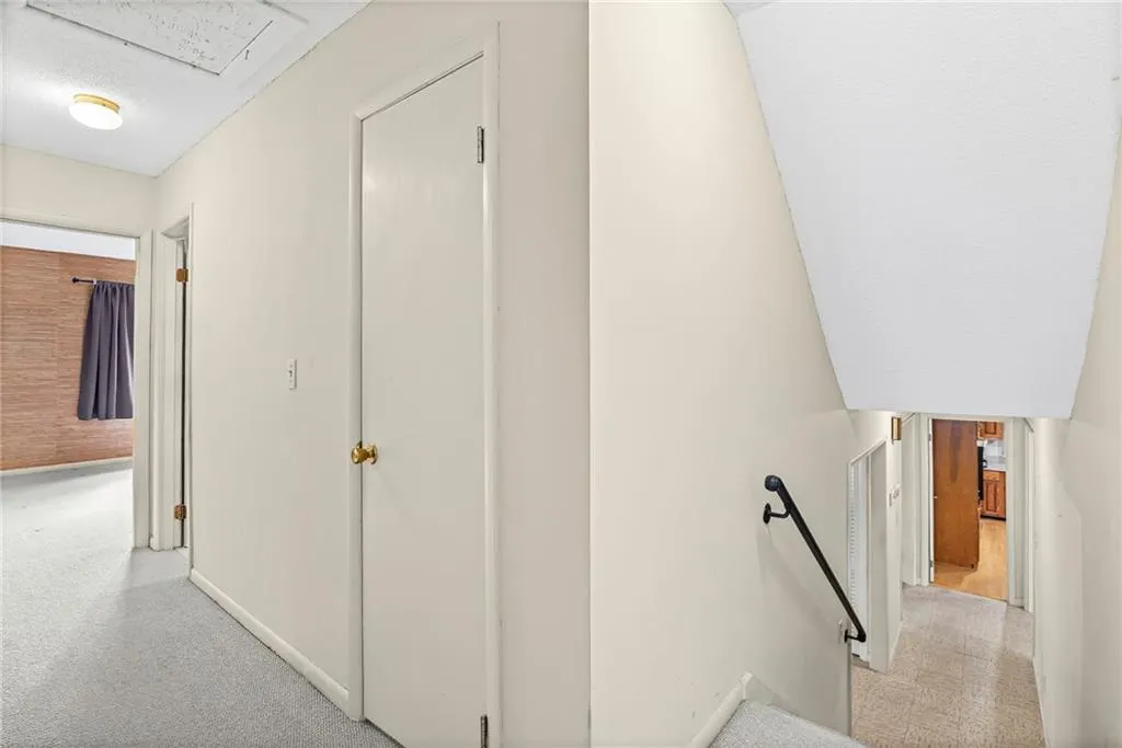 view of upper hallway off the foyer