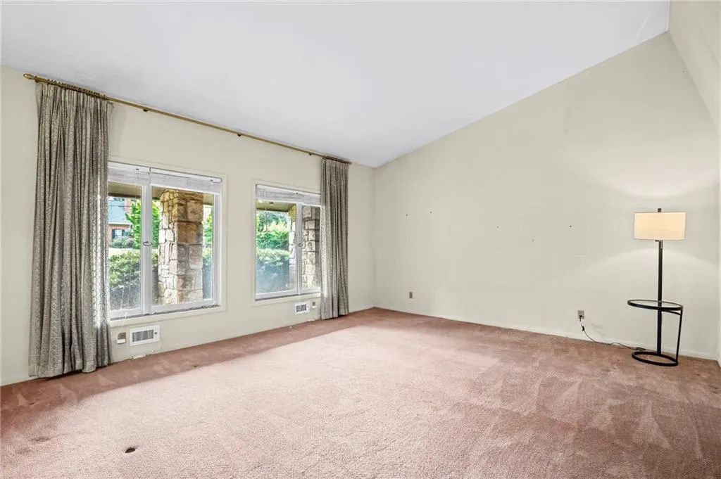 Light filled living room with vaulted ceilings