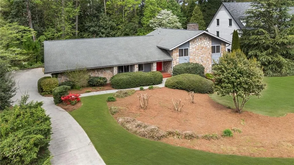 Well maintain landscaping with level front yard