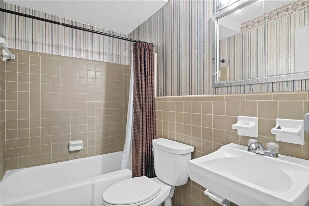 Lower Level Bathroom 3 is shared by Bedrooms 4 and 5.  Tub/shower combo
