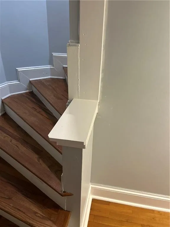 Stairway with wood finished floors