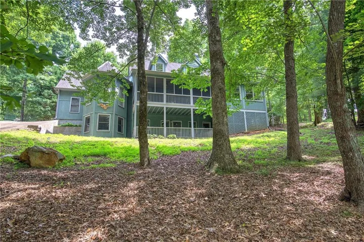 Sitting on .83 acres, this 1998 Van Williams built home is about a minute from the 19th Hole. It sits across the street from Lake Tamarack and has seasonal views of the lake.