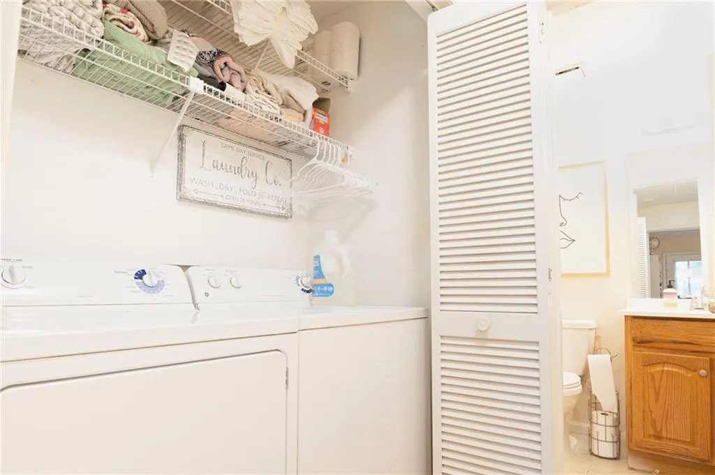 Clothes washing area with washing machine and dryer